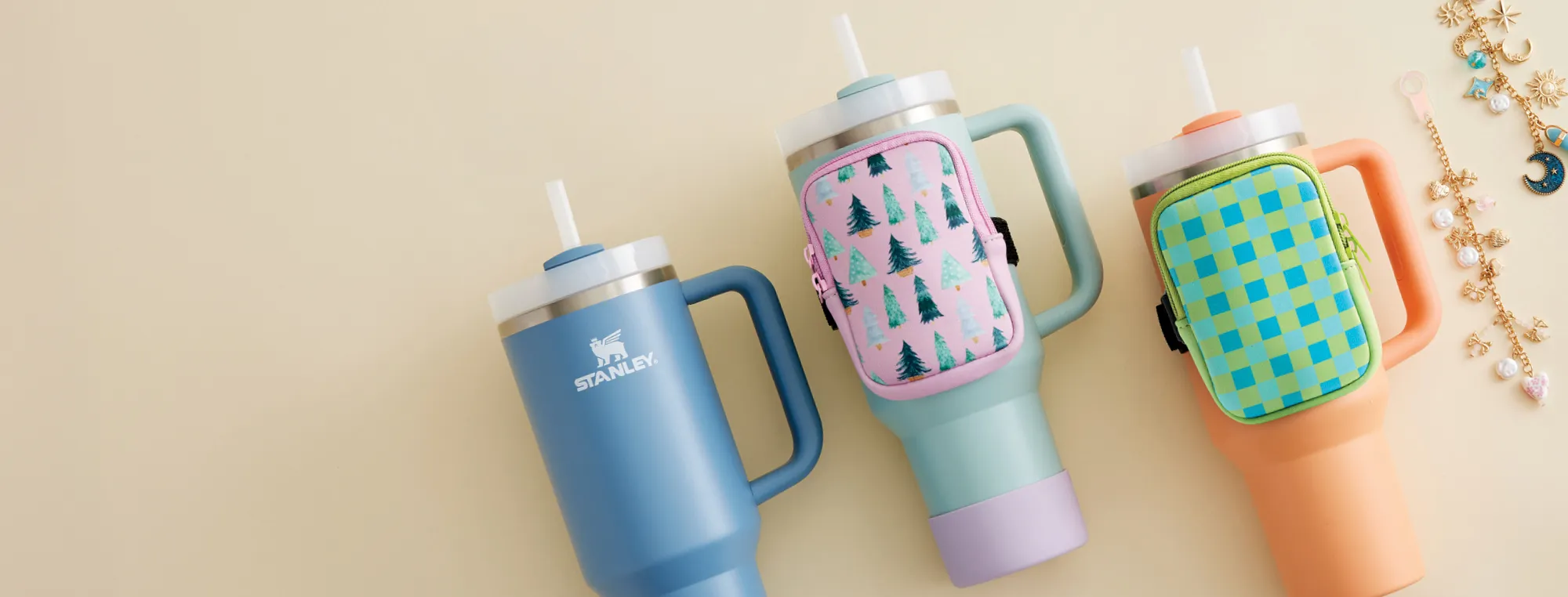 Sippin' pretty Always ready, never thirsty— from work to workout. Shop Now. Image of three Stanley Quencher Water bottles paired with accessories