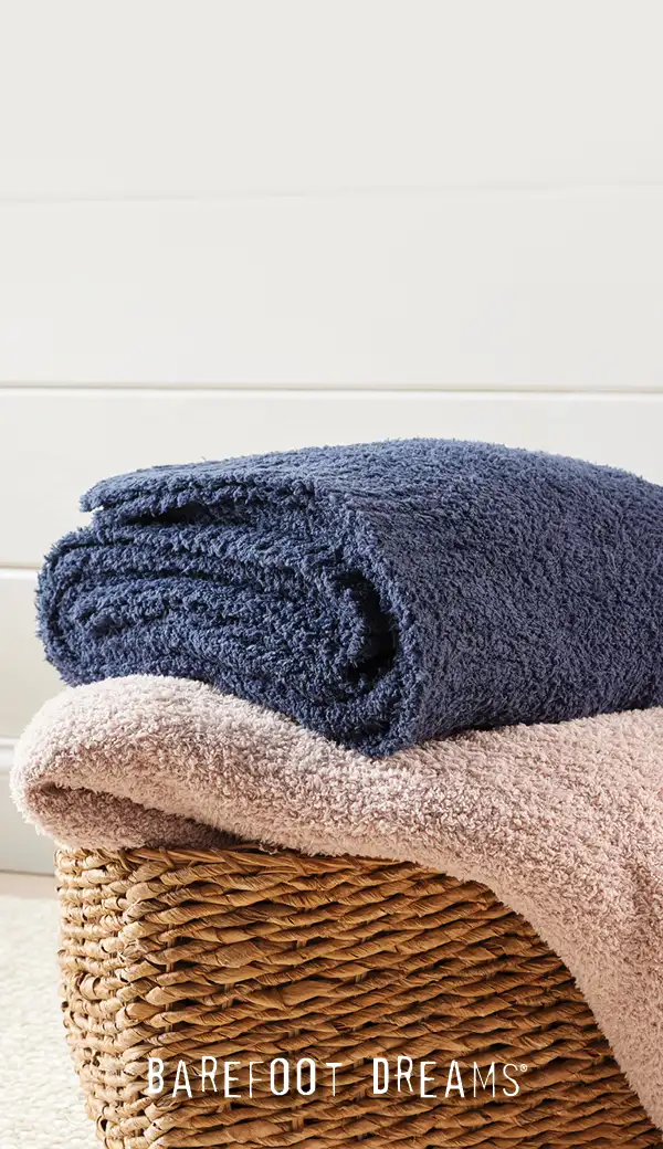 Barefoot dreams blanket basket image. Warm and fuzzies, Snug and stylish, no matter how low the temps go- Shop now.